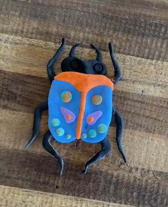 Paper clay insect inspired by Flora Waycott